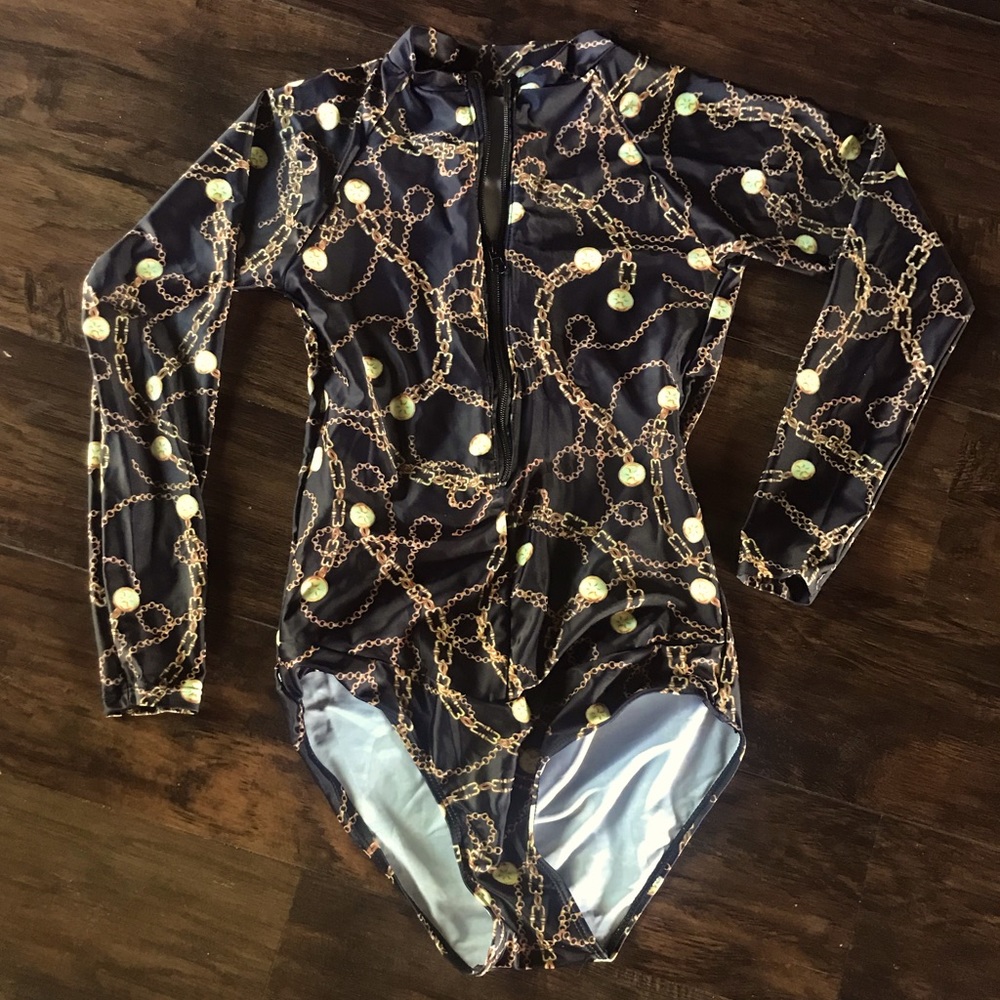 Long sleeve swim suit.